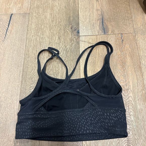 This lululemon black sports bra is a size 4 - Picture 3 of 4